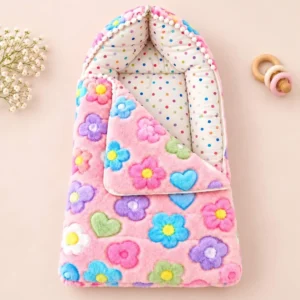 Pink floral baby carry nest with padded sides polka dot lining and matching blanket